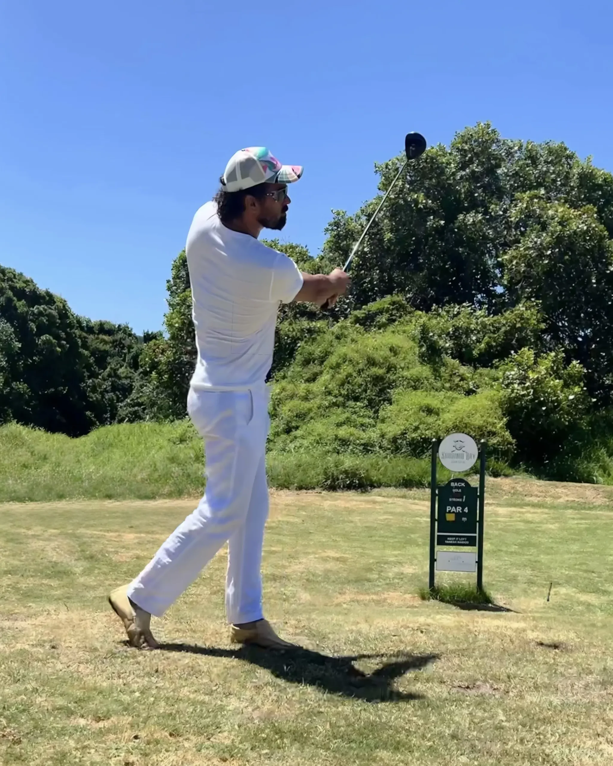Craig Juta Golfing in White v1